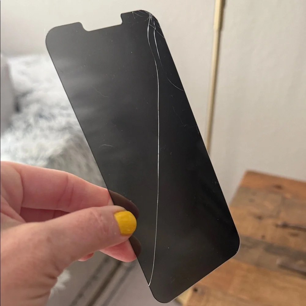 ZAGG cracked Black Screen Protector for iPhone 13promax.